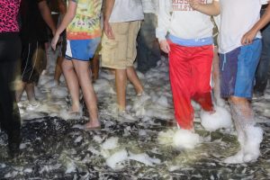 Students dancing in the foam
