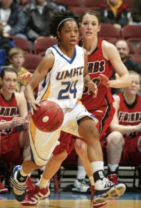 Janee Williams (number 24) takes on an opponent