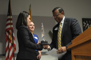 Chancellor Leo Morton accepts the trophy from SIFE’s regional competition at SIFE’s end-of-year ceremony on April 19. Morton was only scheduled to attend the event for several minutes and give a speech, but ended up staying the entire time.