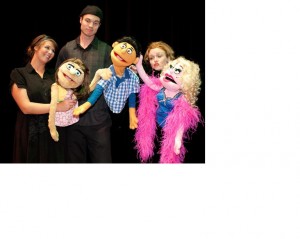 Puppets with their actors.