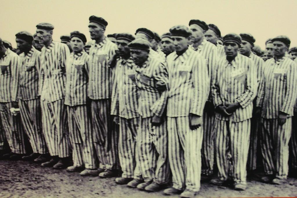  Men convicted of homosexuality are marked by an upside down pink triangle on their clothes. Right: Homosexuals in the Holocaust are underrepresented in Holocaust education. Photo by Meredith Shea