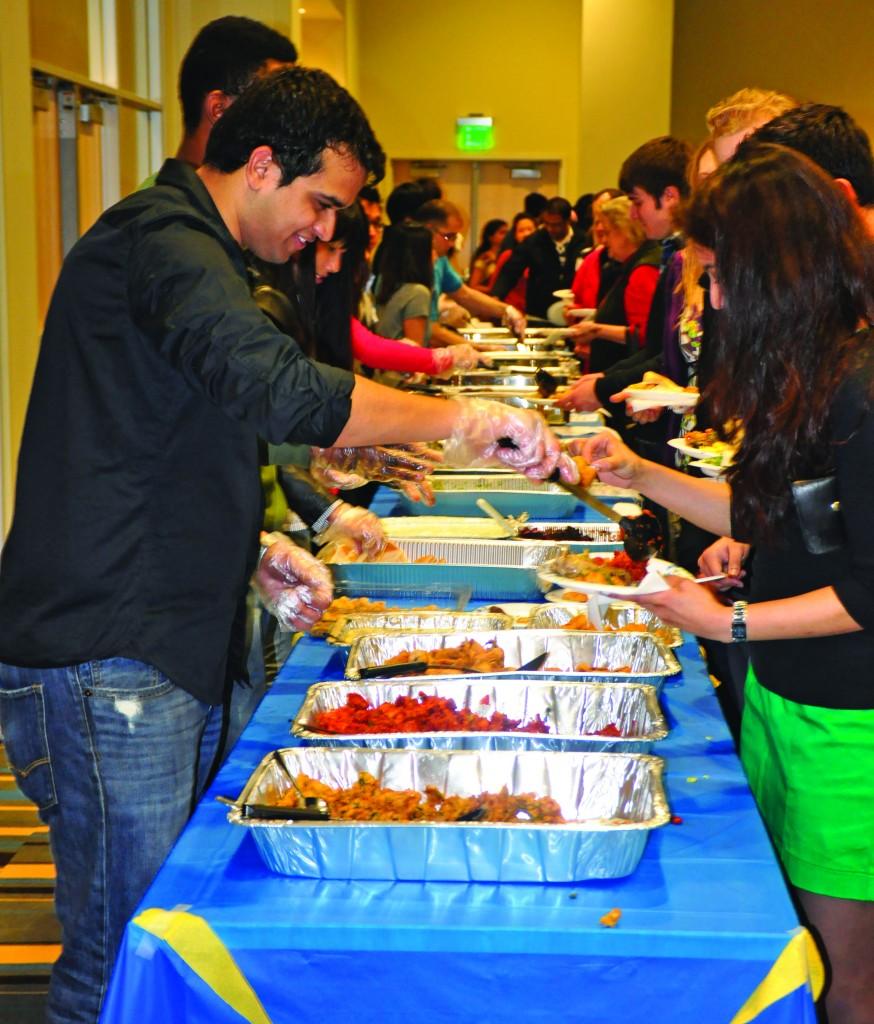 Students enjoy a cafeteria-style buffet of food from across the globe