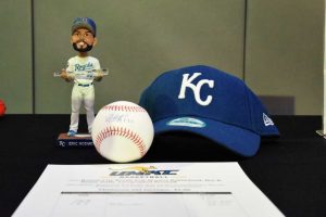The school auctioned off an autographed ball and bobble head from Royal’s player Eric Hosmer. (Source: Chris Gray).