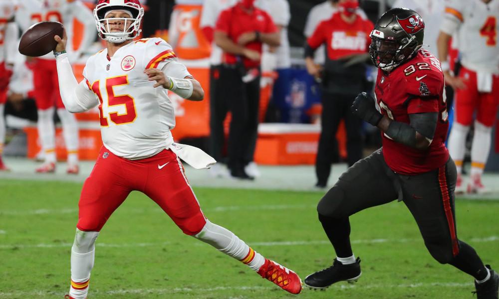 Nov 29, 2020; Tampa, Florida, USA; Kansas City Chiefs quarterback Patrick Mahomes (15) throws as Tampa Bay Buccaneers defensive end William Gholston (92) moves in during the first half at Raymond James Stadium. Mandatory (Kim Klement-USA TODAY Sports)
