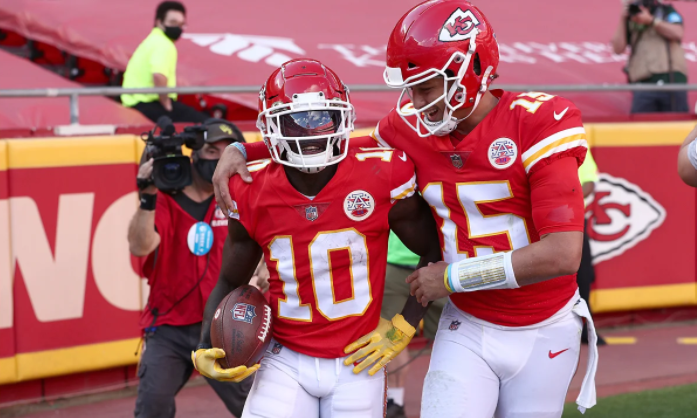 Patrick Mahomes and Tyreek Hill celebrating after a touchdown together