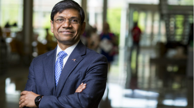 UMKC student chancellor C. Mauli Agrawal posing in the volker campus student union.