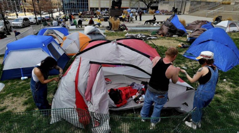 Major Lucas announced his agreement with the KC Homeless Union on April 8 to remove the homeless camps that were erected in Westport and outside City Hall.  (The Kansas City Star)