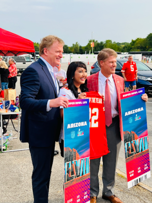 UMKC professor Dr. Amy Patel (middle) accepts the Chiefs Fan of the Year from Chiefs CEO Clark Hunt (right) and NFL Commissioner Roger Goodell (left).
//Photo submitted by Amy Patel