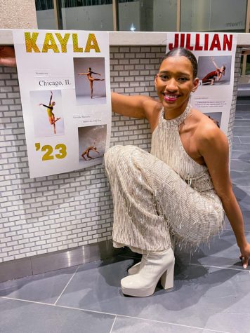 Kayla Brazelton in front of her poster after the show. Photo by Hugo von Reis/RooNews.