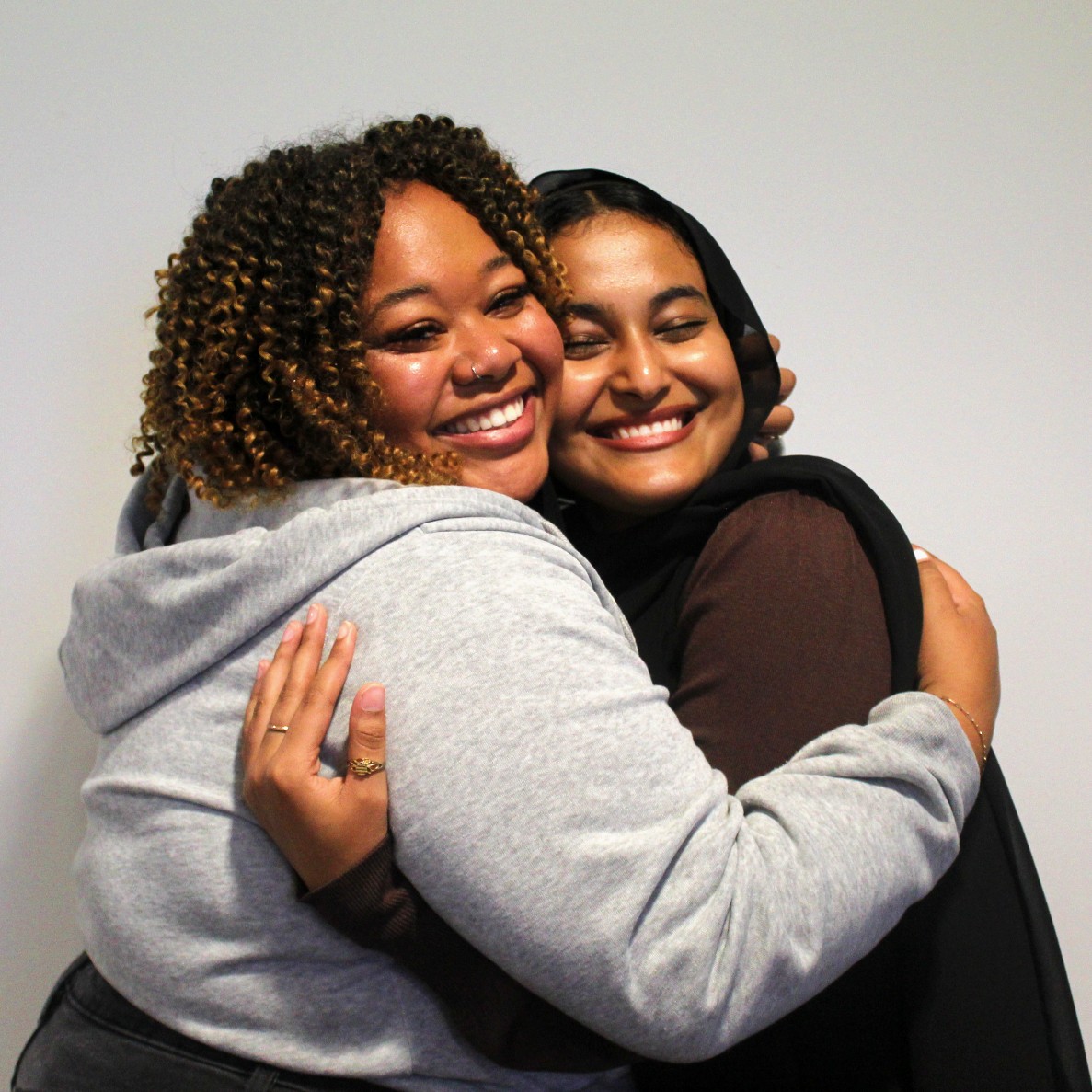 Yasmen Hassen (right) is a part of Roo Red, a group that advocates for free menstrual products on campus. Here she was able to grow her digital marketing and leadership skills.