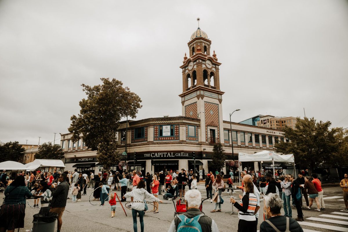 Crowd gathered around the Plaza celebrating the art fair. 