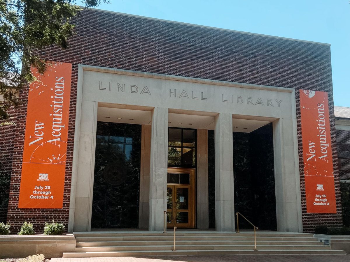  The exterior of the Linda Hall Library entrance. Posters on either side of the front doors highlight their New Acquisitions exhibit.
