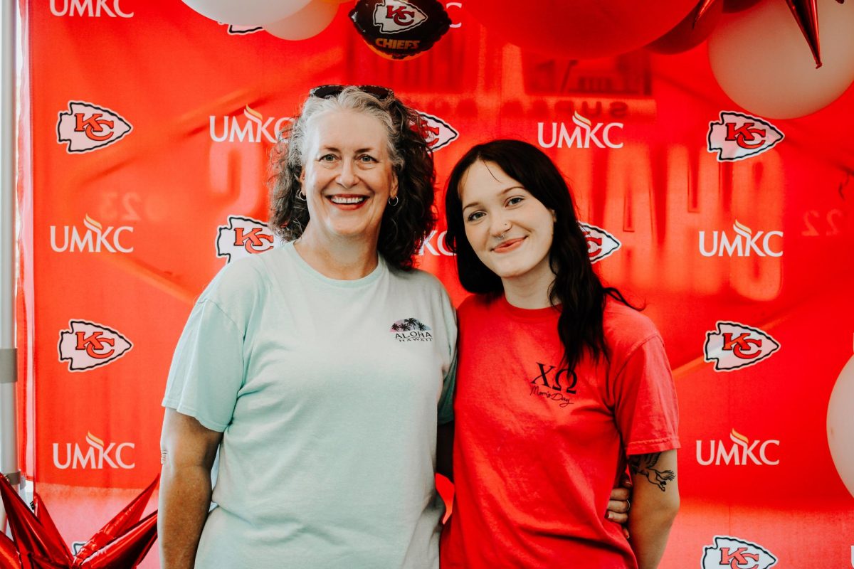 Elisa Till (left) and Natalie Till (right) posing during Family Weekend. 