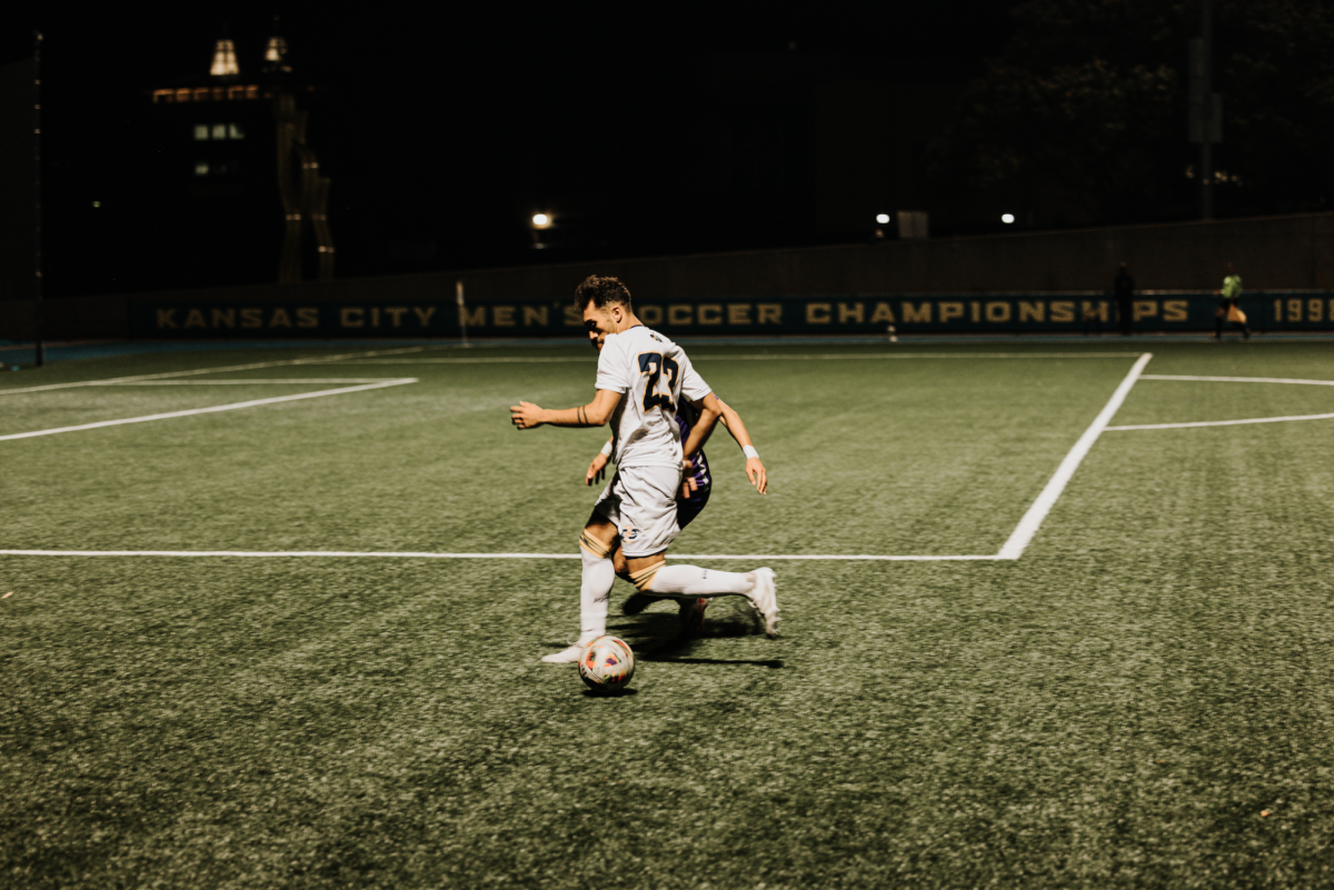 Junior forward Gabriel Fernandes dribbles the ball vs. St. Thomas (Oct. 19).
