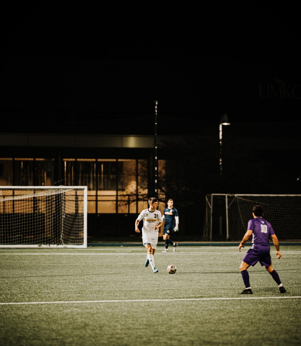 Freshman defender Wesley Cribb prepares to kick the ball (Oct. 19, 2024).