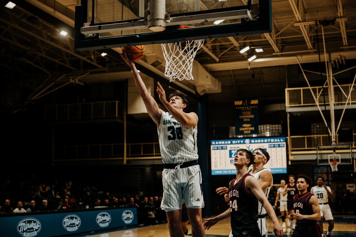 Cameron Faas attempts a layup.