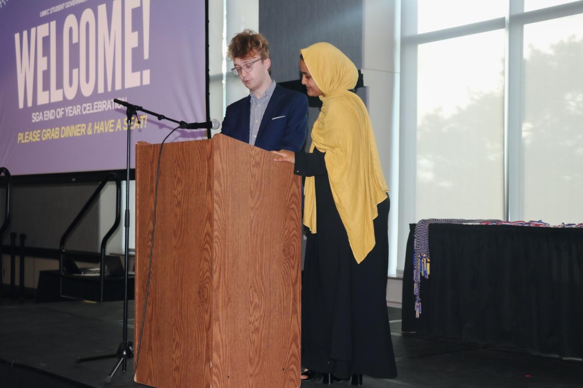 Alex Unseth [left] and Yasmen Hassen [right] speaking at the dinner. 