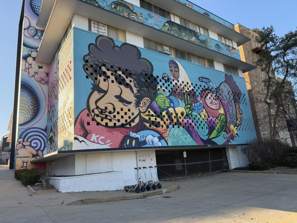 A mural covers the side of a parking garage in the County Club Plaza Kansas City, Missouri.