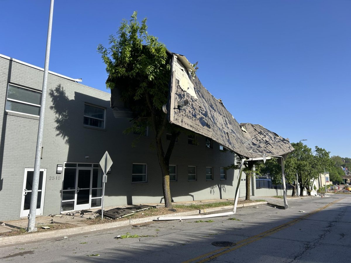 [FILE] Roof blown off downtown business after storms on April 23. 
